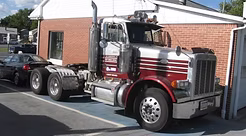 Red and Silver Tow Truck